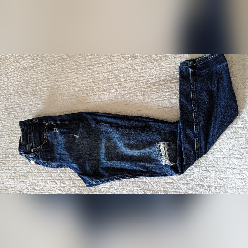 Silver distressed skinny jeans